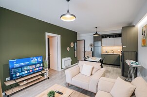 Apartment, Balcony | Living area | 42-inch Smart TV with satellite channels