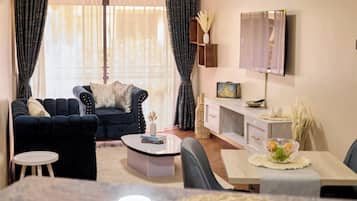 Apartamento económico, vistas a la ciudad | Zona de estar