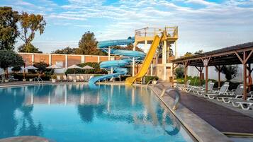 2 outdoor pools, pool umbrellas, lifeguards on site