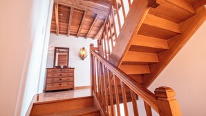 A wooden staircase with a handrail leading to a landing. - Casa Lounell Swimming pool-SPA-Sauna-Games room, panoramic view   (Graulhet)