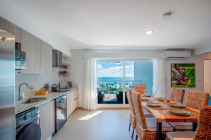 Condo, Multiple Beds, Balcony, Ocean View (Viva Jaco Viva Jaco 12-07B) | Private kitchen | Fridge, microwave, stovetop, dishwasher - Viva Jaco II (Jacó)