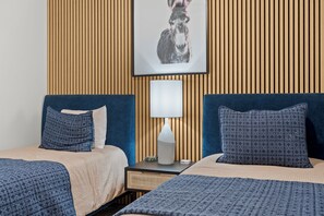 4 slaapkamers, een strijkplank/strijkijzer, reisbedje, gratis wifi