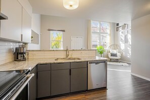 Microwave, oven, stovetop, dishwasher - Stylish Townhouse w/ Spa-like Décor! (Wheat Ridge)