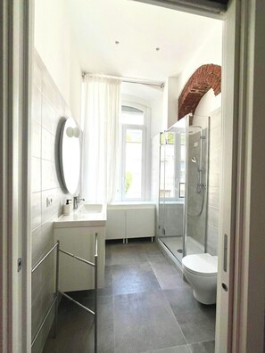 Hair dryer, towels, soap, shampoo