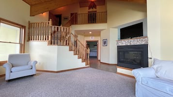Smart TV, fireplace, DVD player, books