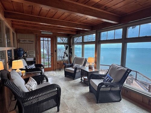 Beachfront lake house with large deck, beach bonfire & stunning views! 