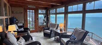 Beachfront lake house with large deck, beach bonfire & stunning views! 