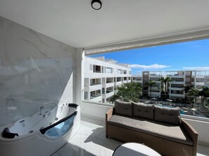 Premium Queen with Jacuzzi | Terrace/patio - All Seasons Hotel Bayahibe (San Rafael del Yuma)