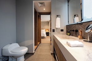 Shower, eco-friendly toiletries, hair dryer, towels