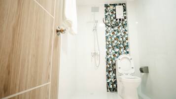 Hair dryer, towels, soap, shampoo