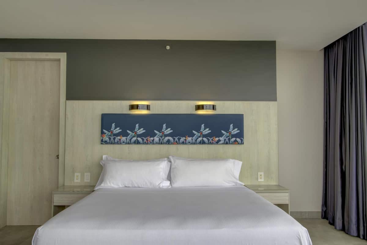 Room, 1 King Bed, River View | In-room safe, desk, laptop workspace, blackout curtains