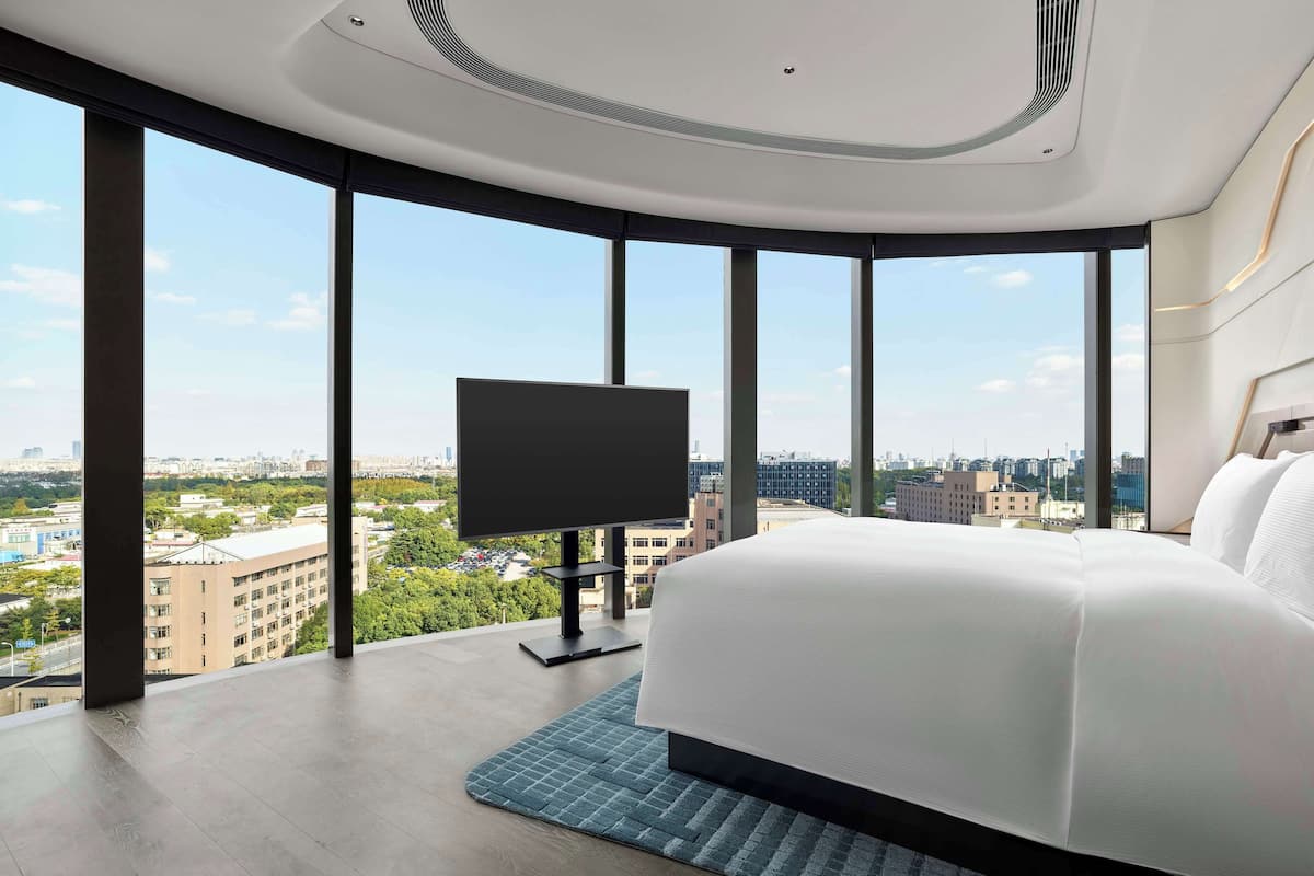 Suite, 1 Bedroom (Airport View) | Down comforters, minibar, in-room safe, desk