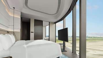 Suite, 1 Bedroom (Airport View) | Down comforters, minibar, in-room safe, desk