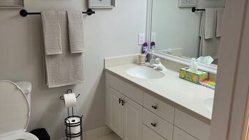 Hair dryer, towels, soap, shampoo