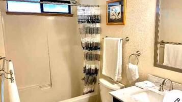 Hair dryer, towels, soap, toilet paper