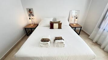 2 dormitorios, tabla de planchar con plancha, wifi y ropa de cama