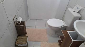 Shower, towels, toilet paper