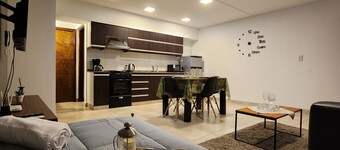 New apartment, excellent location. Free parking space a few meters away from the departmental plaza.