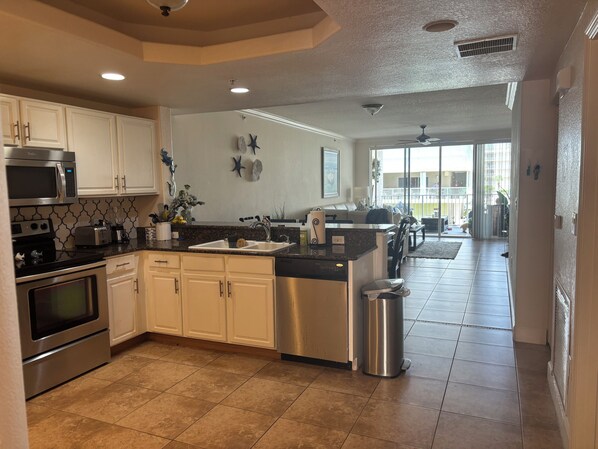 Private kitchen - Beautiful Mystic Vistas in Cape Canaveral space coast and private beach access! (Cape Canaveral)