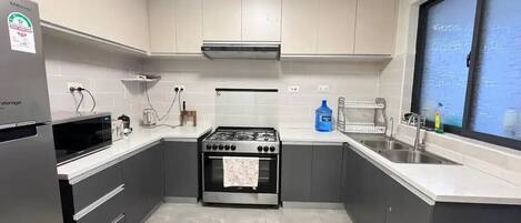 Fridge, microwave, stovetop, electric kettle