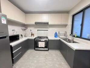Fridge, microwave, stovetop, electric kettle