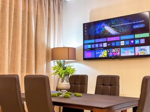 Luxury Apartment, Garden View | Television - Luxoria home - 2 min to corniche (Tangier)
