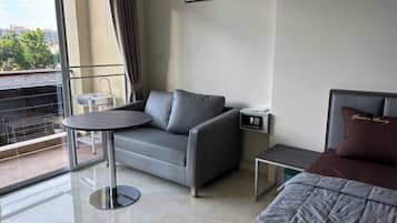 Condo superior, vista para a praia | 1 quarto, cofres nos quartos, escrivaninha