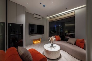 Leilighet – executive, utsikt mot innsjø | Oppholdsområde | Smart-TV