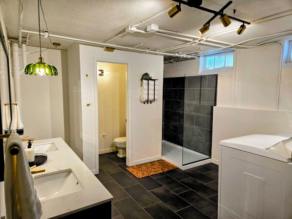 Shower, hair dryer, towels, soap