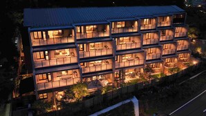 A multi-story hotel with balconies and outdoor seating areas. - Rakuten STAY TERRACE Hakone Kowakudani (Hakone)