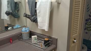 Hair dryer, towels, soap, toilet paper