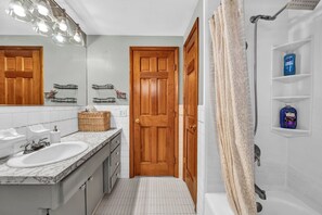 Hair dryer, towels, soap, shampoo