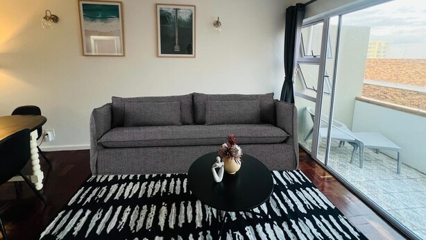 Living area - 1 bedroom apartment in vibrant Sea Point, 300m from the Promenade! (Cape Town)