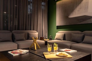 Luxury Apartment | Living area | 45-inch LED TV with cable channels - Forever W&L Building (Medellín)