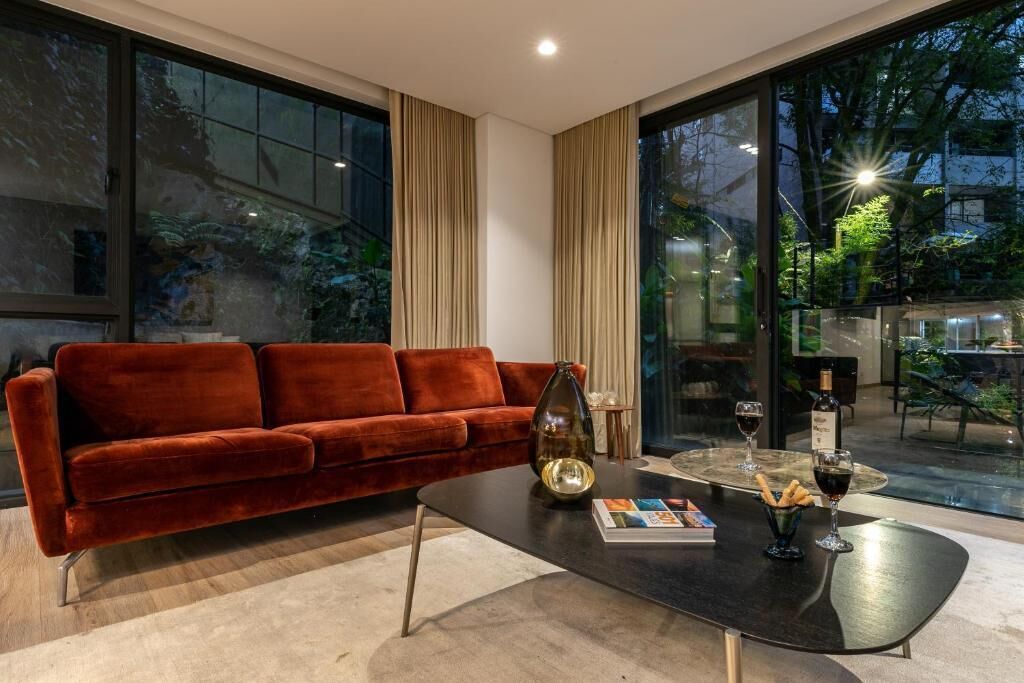 Design Apartment | Living area | 45-inch LED TV with cable channels