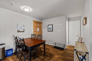 Cozy dining table that seats 4—perfect for intimate meals and relaxed conversations.