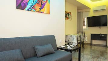Apartment, 1 Bedroom, Balcony, Garden View | Living area