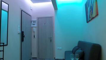 Apartment, 1 Schlafzimmer, Balkon, Gartenblick | Wohnbereich