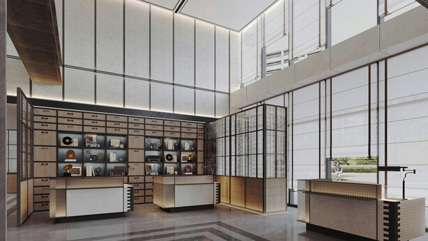 A modern reception area with a central desk, storage cabinets, and a large window offering a view of the outdoors. - Four Points Datong Pingcheng (Datong)