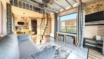 Domek (690) | Zona de estar | Una televisión de pantalla plana