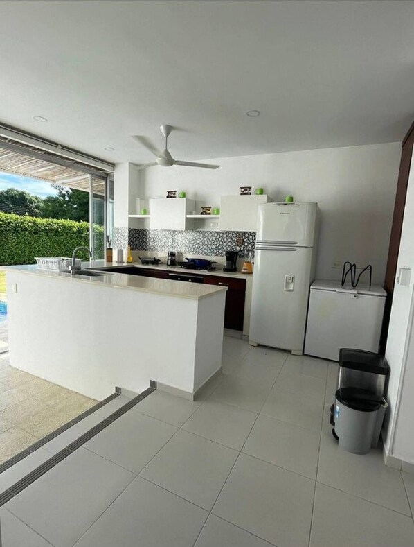 Apartamento, 5 quartos, piscina particular, vista para o jardim | Parte interna