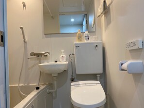 Hair dryer, bidet, towels, soap