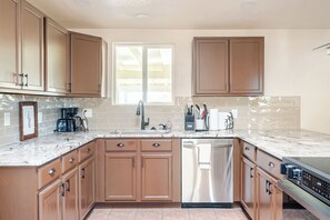 Dishwasher, paper towels, dining tables