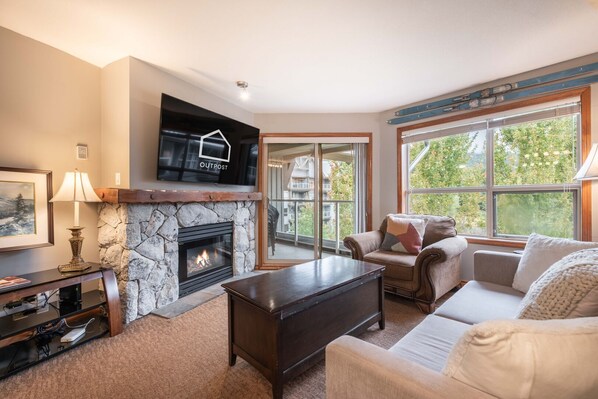 TV, fireplace - NEW Condo | Ski-in/ski-out | Shared pool & hot tub (Whistler)