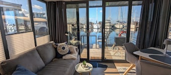 Houseboat Fjord Stella with bio sauna and roof terrace in Wendtorf/ Kiel Fjord