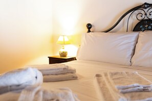 2 bedrooms, blackout curtains, soundproofing, iron/ironing board