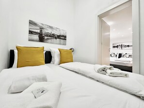 Apartamento família, vista para o pátio | 1 quarto, cortinas blackout, ferros/tábuas de passar roupa