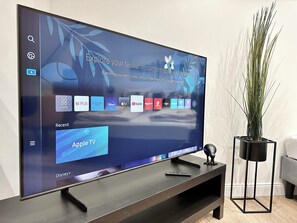 Apartamento família, vista para o pátio | Área de estar