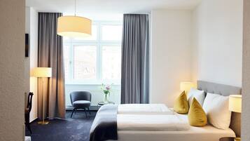 Habitación cuádruple familiar, no fumadores | Ropa de cama hipoalergénica, escritorio, sistema de insonorización