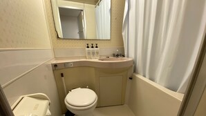A compact bathroom with a toilet, sink, and mirror. - W210 Tokyo Monthly Rental - Sakurashinmachi Single (Setagaya City)